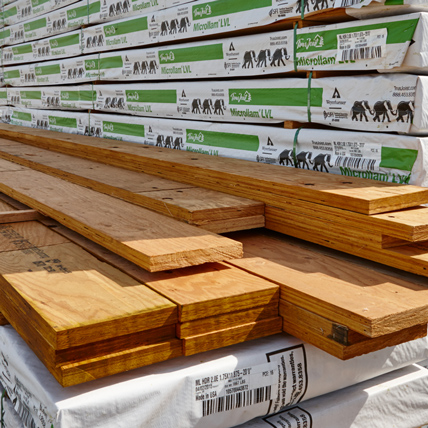 A close up of a stack of engineered lumber.