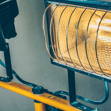 Close up of a construction flood light.