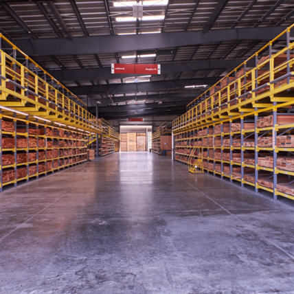Covered lumber yard with decking.
