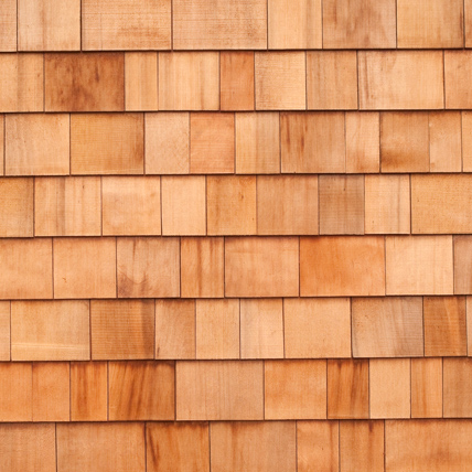 Wooden siding on the side of a building.